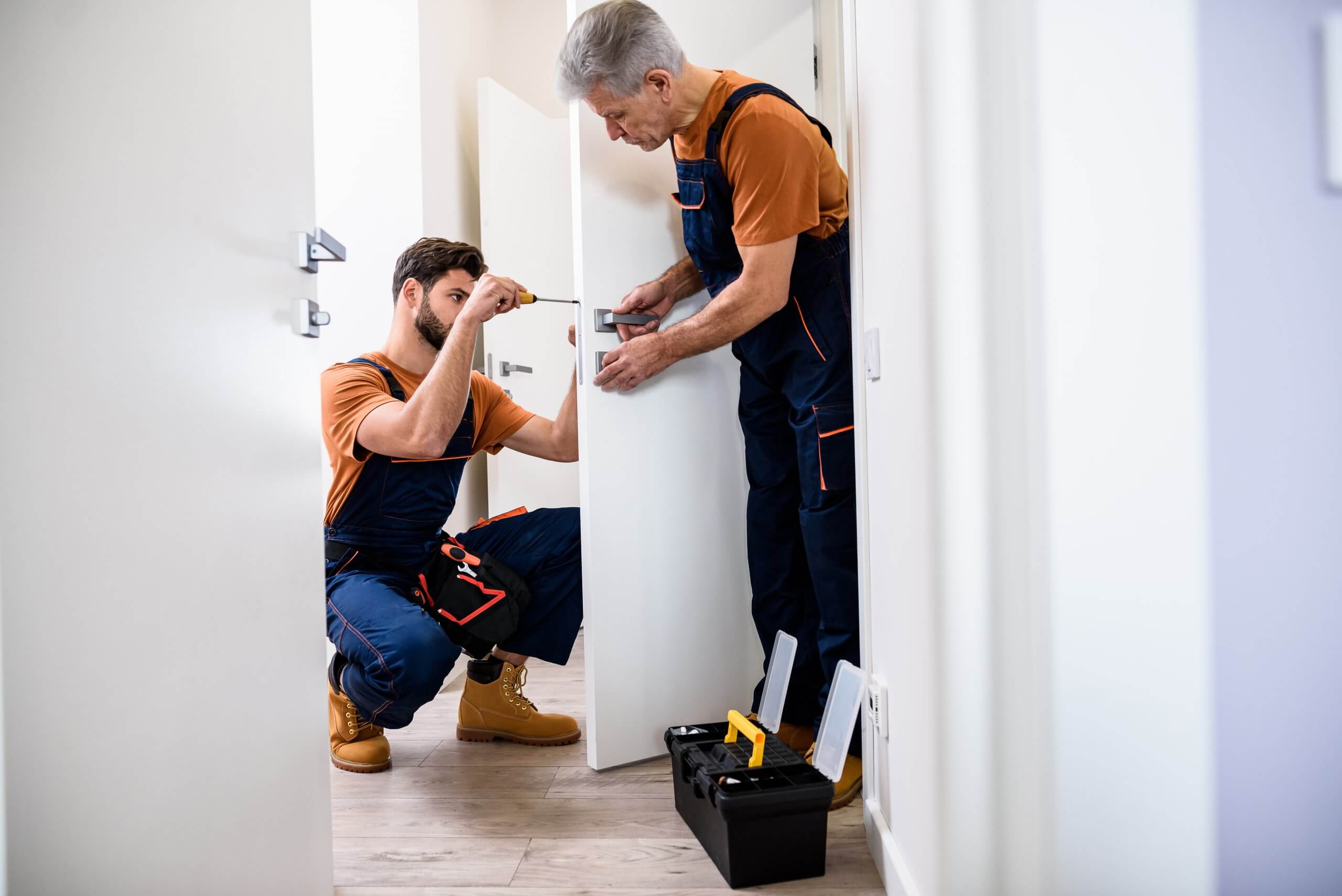 2-men-installing-hardware