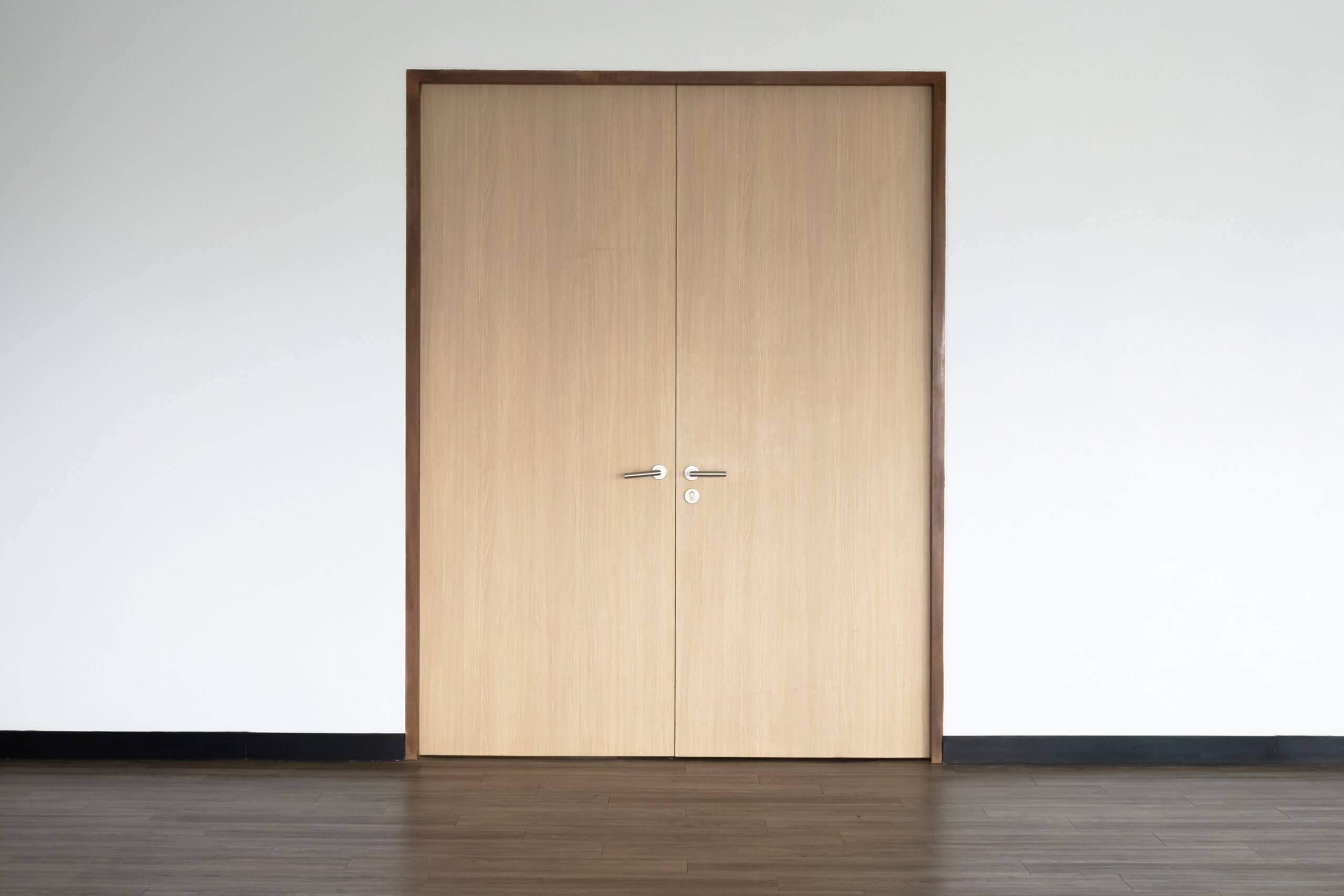 Which Types of Commercial Doors Are Best at Minimizing Noise?